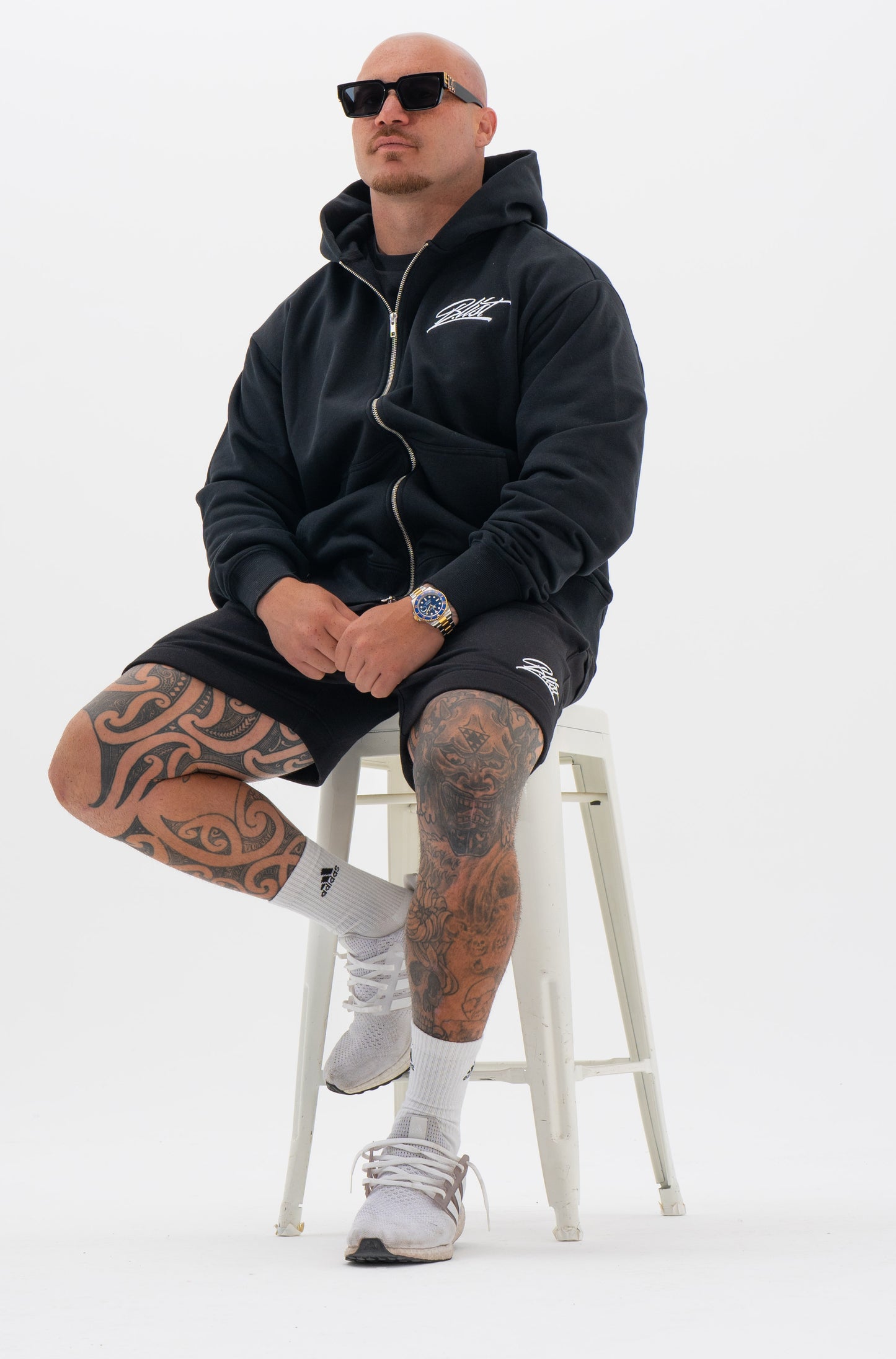 EMBROIDERED BLACK TRACK SHORTS